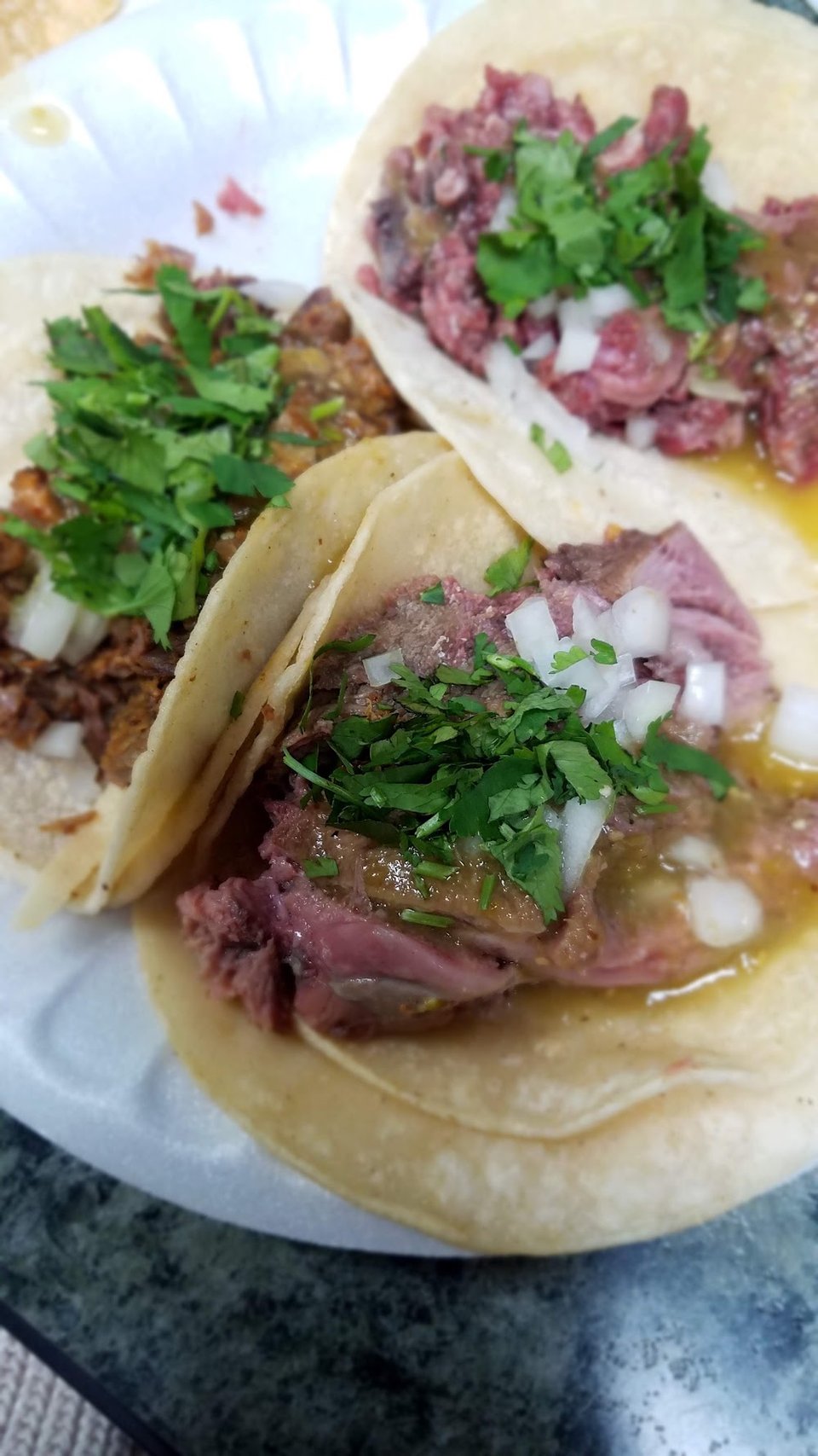 Spanish and English menu items on display.
