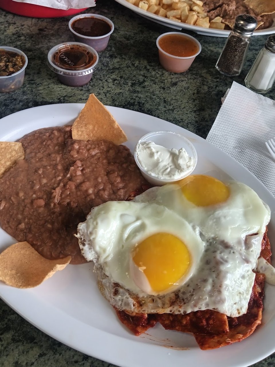 Restaurant menu with comfort food and small plates.